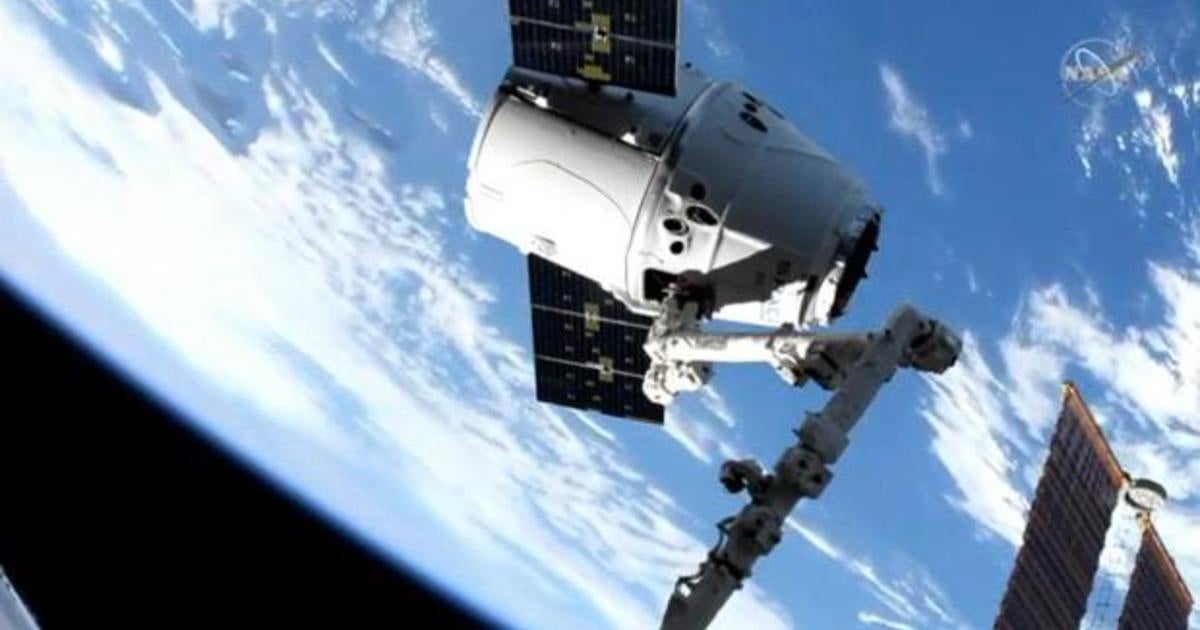 SpaceX cargo ship reaches space station after two-day chase - CBS News