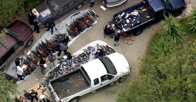 Man arrested after police seize 1,000 guns from mansion CBS News