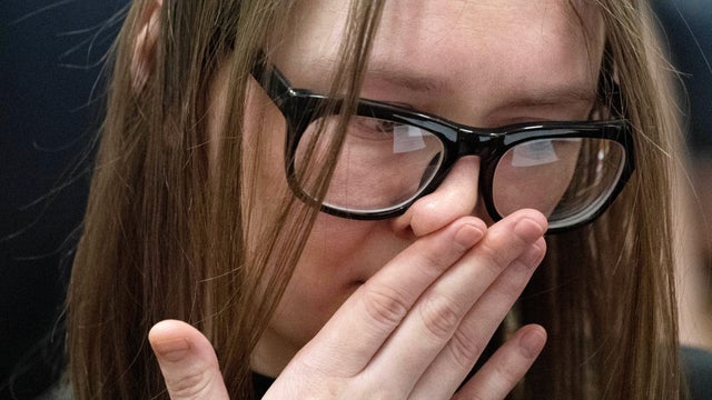 Anna Sorokin, who a New York jury convicted of swindling more than $200,000 from banks and people, reacts during her sentencing in the Manhattan borough of New York May 9, 2019. 