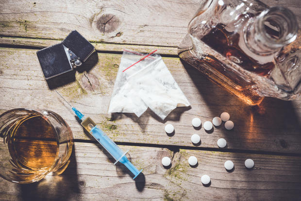 drugs alcohol liquor syringe opioids addiction 