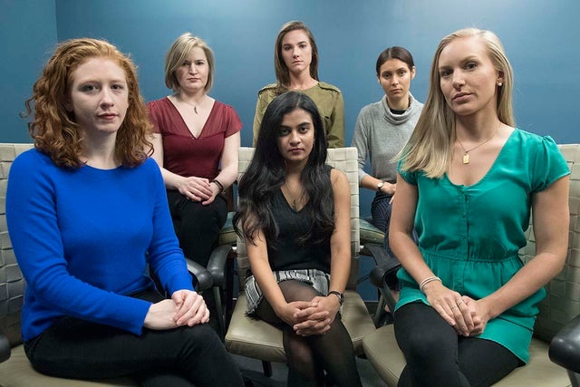 From left back row, Annemarie Brown, Andrea Courtney and Marissa Evans and, from left front row, Sasha Brietzke, Vassiki Chauhan and Kristina Rapuano pose in New York Nov. 14, 2018. The women filed a lawsuit against Dartmouth College for allegedly allowin