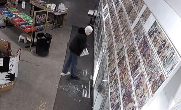 comic book thief smashes glass 