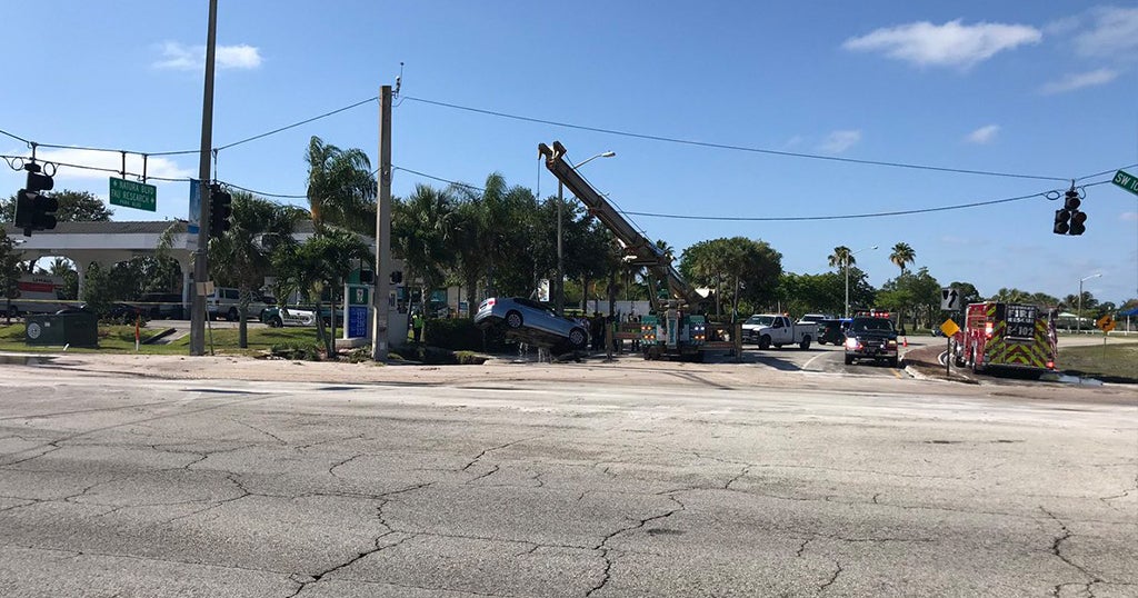 Car Crashes Into Fire Hydrant, Creates Sinkhole In Deerfield Beach