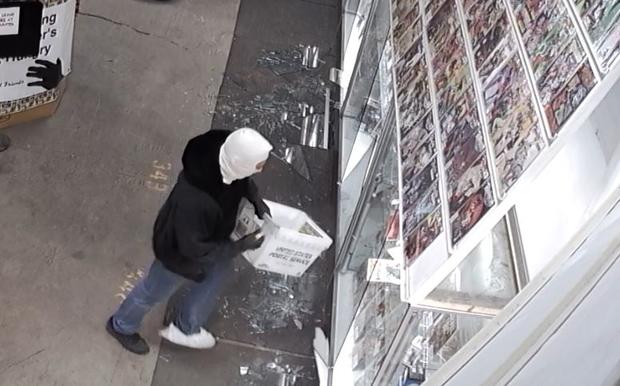 comic book thief smashes glass 2 