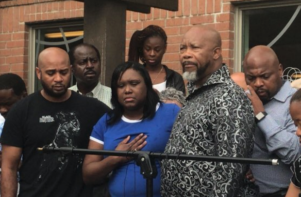 Tina Tyler speaks at vigil for her son Malik Tyler 