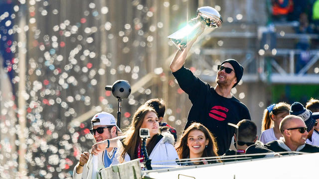 Tom Brady Chugs Beer, Shows Off Super Bowl Rings at Ceremony