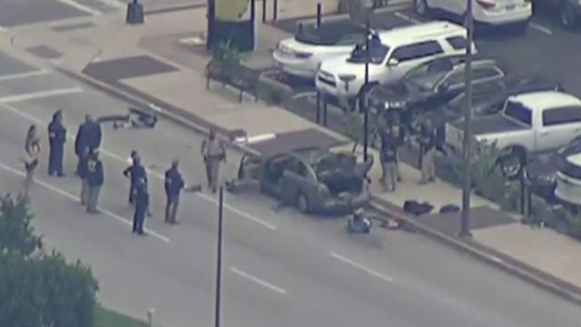 cbsn-fusion-masked-gunman-is-killed-dallas-courthouse-after-exchanging-shots-with-officers-thumbnail-1875404.jpg 