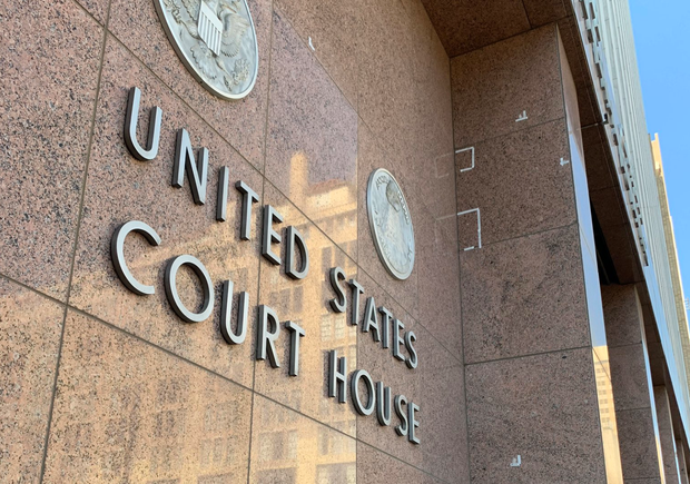 Bullets damaged the granite outside the Earle Cabell Federal Building in Dallas 