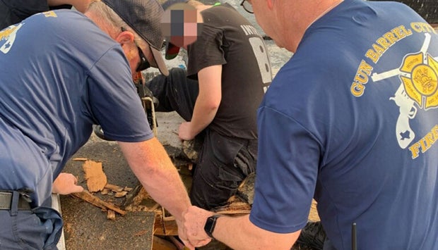 Worker's Leg Goes Through Roof 