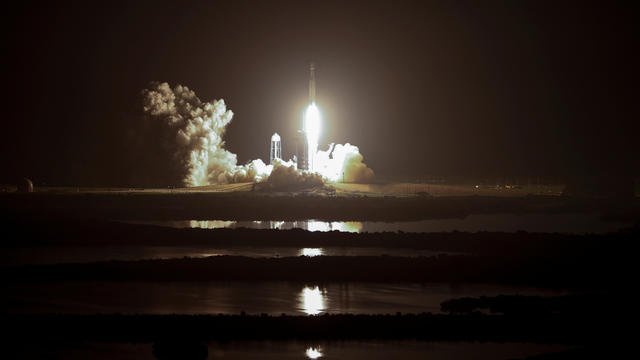 A SpaceX Falcon Heavy rocket, carrying the U.S. Air Force's Space Test Program 2 Mission, lifts off from the Kennedy Space Center in Cape Canaveral, Florida 