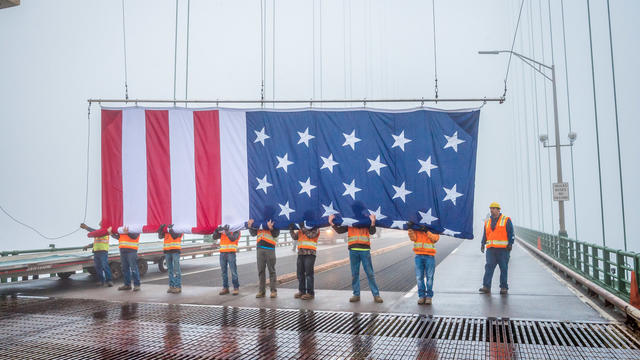 mba-workers-hanging-flag-memorial-day-2017.jpg 