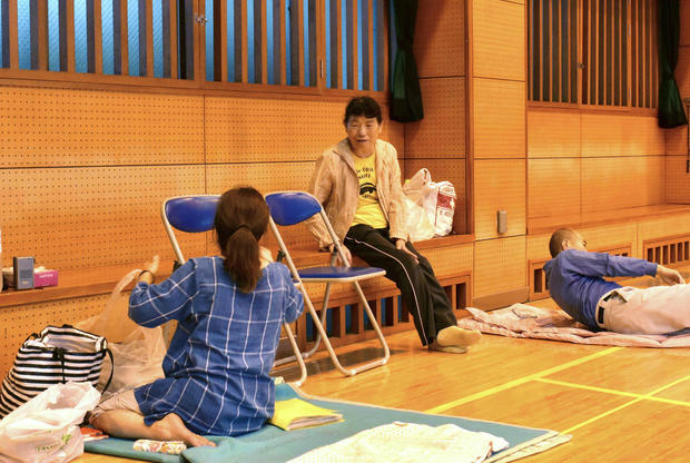 Local residenst take a rest at a shelter in evacuation centre as heavy rains threatened to trigger landslides and cause other damage, in Kagoshima, Japan 
