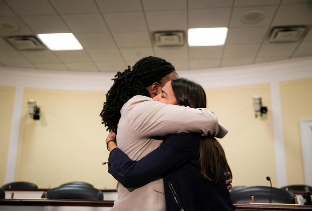 Reps. Ayanna Pressley and Alexandria Ocasio-Cortez hug during a news conference with Yazmin Juarez, mother of 19-month-old Mariee, who died after detention by U.S. Immigration and Customs Enforcement (ICE), on Capitol Hill in Washington 