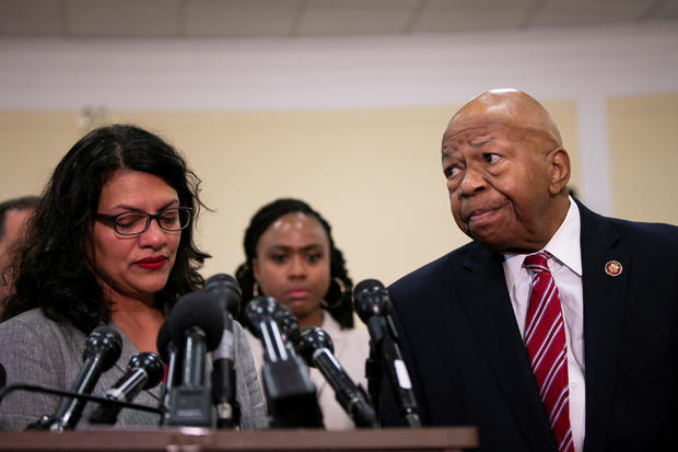 Elijah Cummings (D-MD) speaks with Representative Rashida Tlaib (D-MI) during a news conference with Yazmin Juarez, mother of 19-month-old Mariee, who died after detention by U.S. Immigration and Customs Enforcement (ICE), on Capitol Hill in Washington 