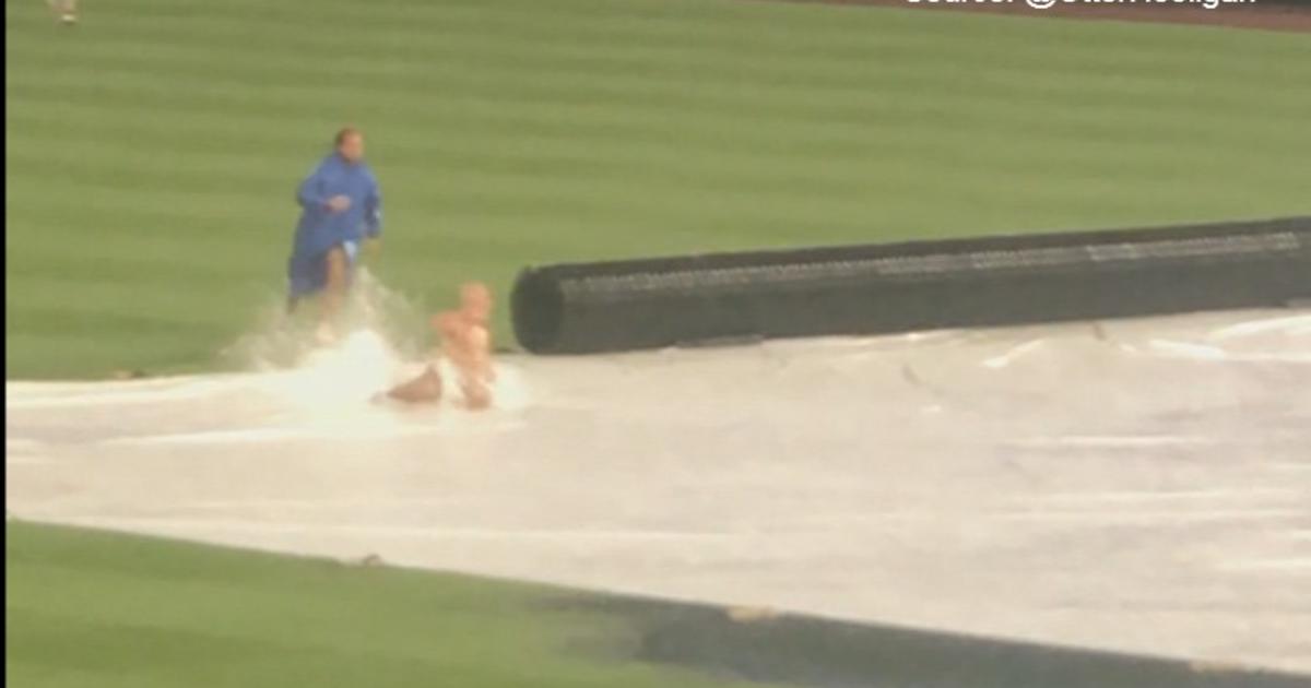 WATCH: Rogue Fan Uses Tarp As Slip `N Slide During Phillies-Dodgers Rain  Delay At Citizens Bank Park - CBS Philadelphia