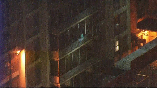 west-powelton-fire-man-climbs-down.png 