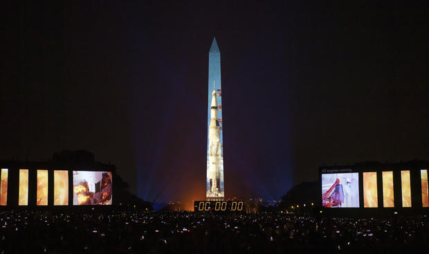 Apollo 11 Saturn V Rocket Projected On The Washington Monument 