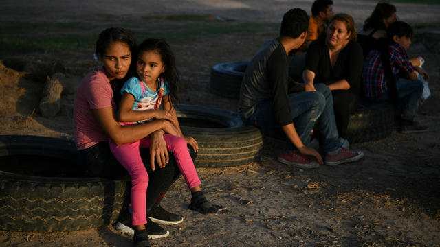 Central American asylum seekers turn themselves in to U.S. Border Patrol after illegally crossing the Rio Grande in Los Ebanos 