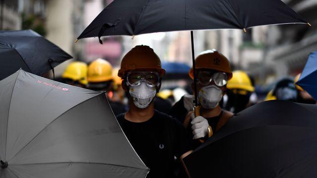 cbsn-fusion-hong-kong-police-fired-tear-gas-and-rubber-bullets-at-pro-democracy-demonstrators-as-they-tried-to-reach-the.jpg 