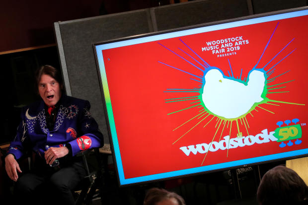 Singer John Fogerty speaks during the announcement event for the lineup for the Woodstock 50th anniversary concert in New York March 19, 2019. 