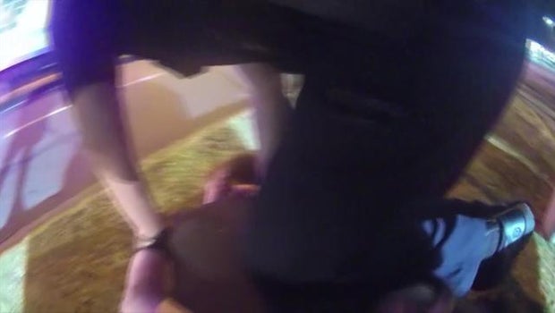 Disturbing video shows cops joke before restrained man's death 