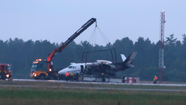 A private Cessna 560XL aircraft is seen after crashing while landing at Aarhus Airport in Tirstrup 