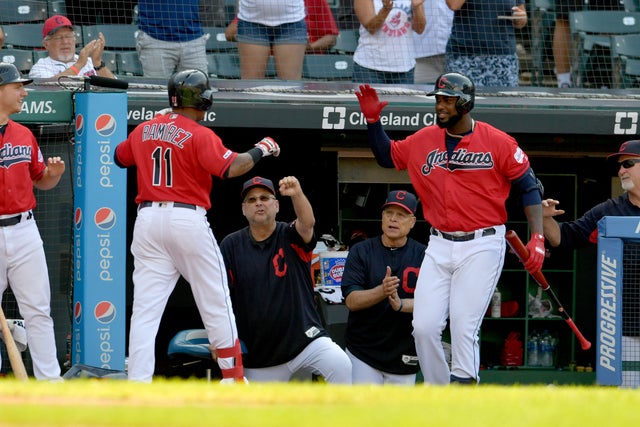 Jose Ramirez #11 celebrates with Terry Francona 