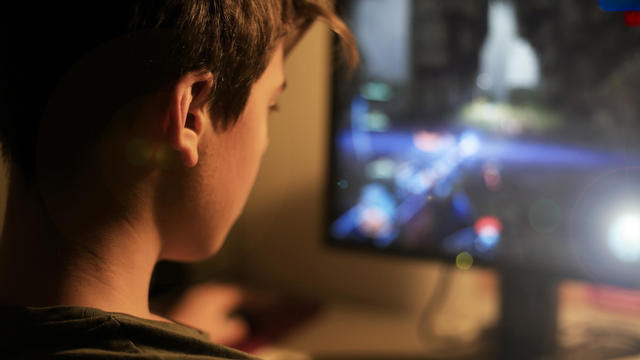 Teenage boy addicted to video games 