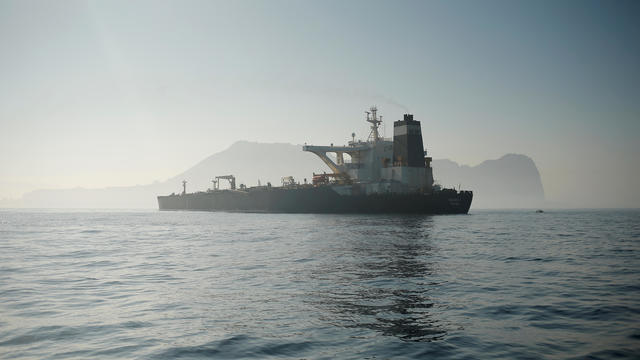 FILE PHOTO: Iranian oil tanker Grace 1 sits anchored after it was seized in July by British Royal Marines off the coast of the British Mediterranean territory, in the Strait of Gibraltar 