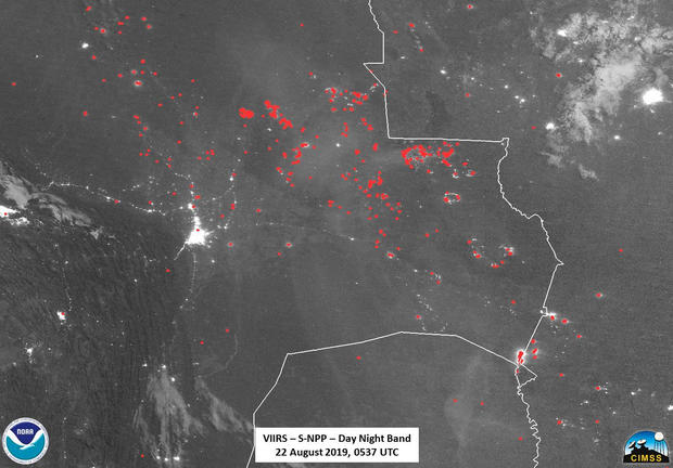 Active fires, represented by red dots, are pictured from space over Bolivia 
