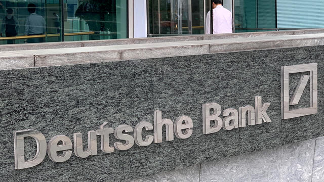 FILE PHOTO: The logo of Deutsche bank is seen in Hong Kong 