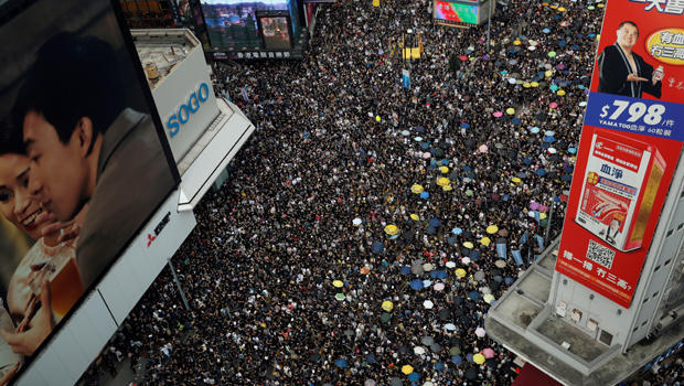 FILE PHOTO: Anti-extradition demonstrators march to call for democratic reforms, in Hong Kong 