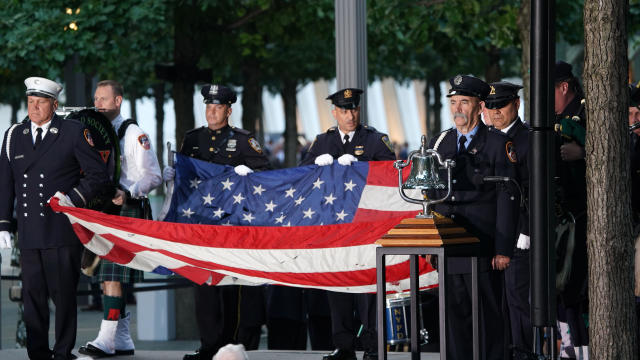 Flag-bearers take part in the September 11 commemoration ceremony at the 9/11 Memorial and Museum at the World Trade Center on September 11, 2019, in New York. 
