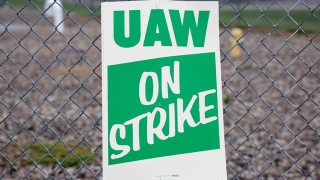 A United Auto Workers (UAW) picket sign is seen outside General Motors Powertrain Flint Engine plant during the UAW national strike in Flint 