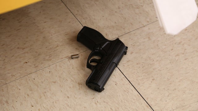 suspect-firearm-and-officer-casing.jpg 