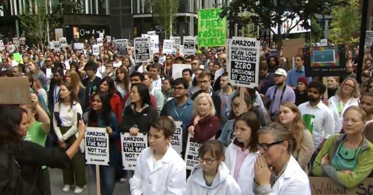 Millions March Demanding Action On Climate Change - CBS News