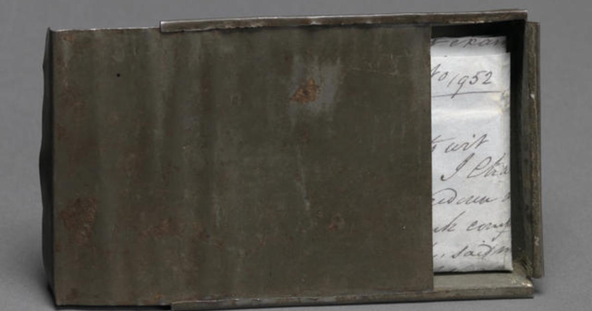 Smithsonian Artifacts: Tin Wallet And Freedom Papers - CBS News