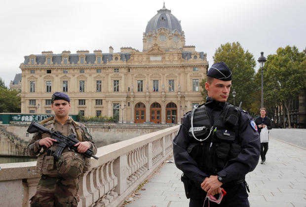 French police secure the area in front of the Paris police headquarters in Paris, France, October 3, 2019. 