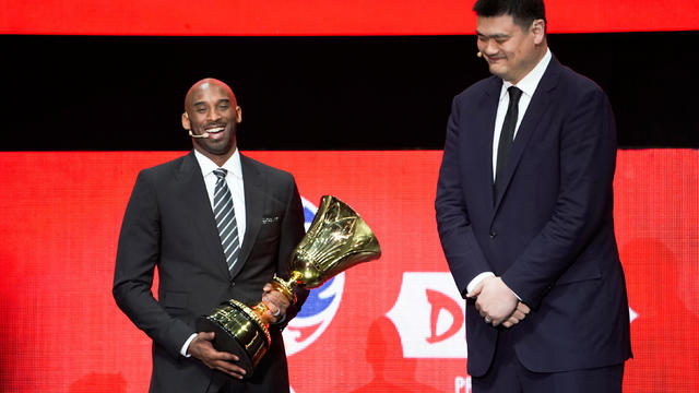 Retired NBA player Kobe Bryant and former Chinese basketball player Yao Ming attend the draw of FIBA World Cup 