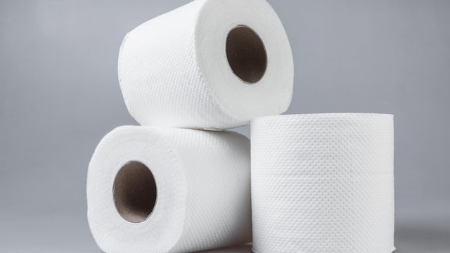 Stack of white tissue paper rolls. 