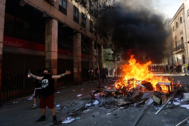 Protests Continue In Chile After President Pi&ntilde;era Declared State of Emergency And Suspended Subway Fare Hike 