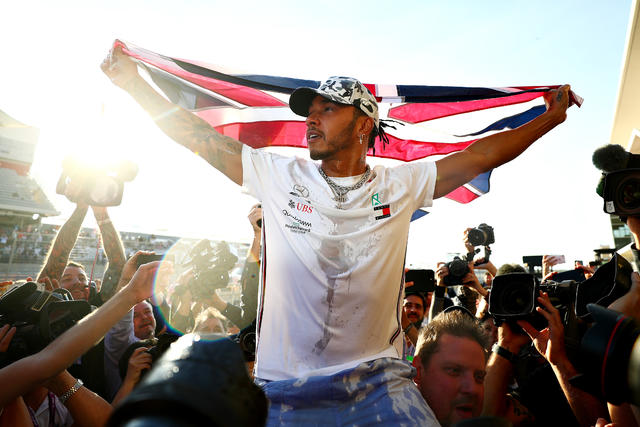 Lewis Hamilton Gifted Honorary Ball At First Broncos Game As Co-Owner