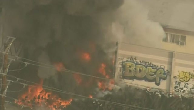 Fire Breaks Out In Stack Of Wooden Railroad Ties In Commerce