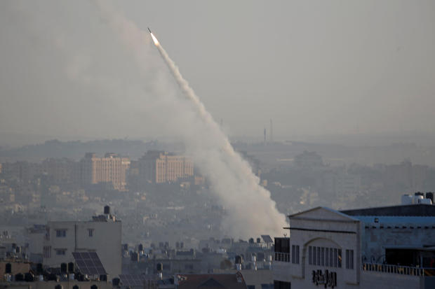 Rocket is fired from Gaza towards Israel, in Gaza 