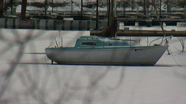 Sailboat-Frozen-In-St-Croix-River-In-Stillwater.jpg 