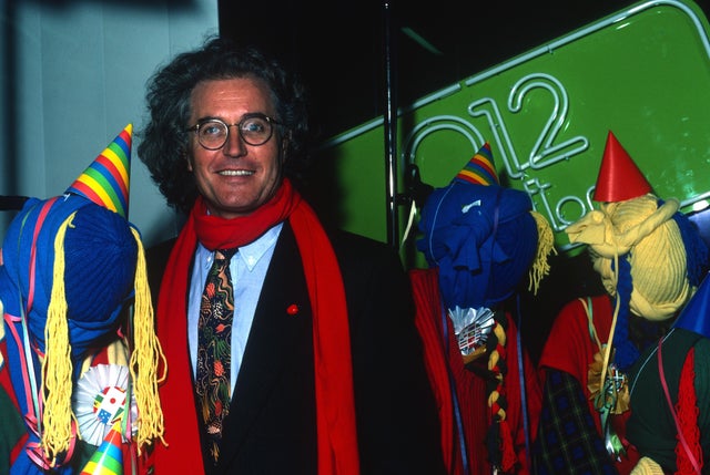 Luciano Benetton Posing For A Photo