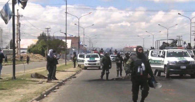 Bolivia headed for new elections amid violence; handful of Hong Kong protesters hold their ground