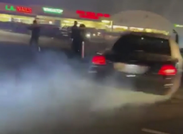 Car spinning out in Dallas shopping center parking lot 