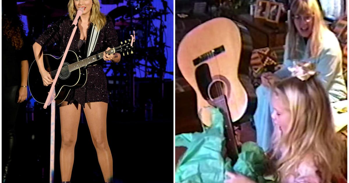 Taylor Swift Receives One of Her First Guitars in “Christmas Tree Farm”  Music Video