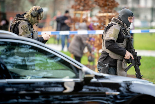 Police officers are seen near the site of a shooting in Ostrava 